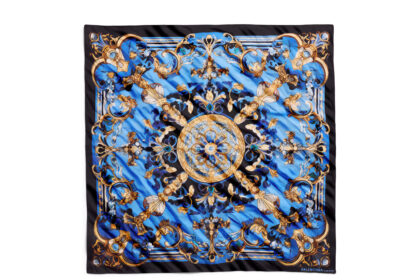 Balenciaga launches a £220 AI generated silk scarf in its Winter 25 range, sparking debate after earlier controversy over a £775 plastic style tote bag.