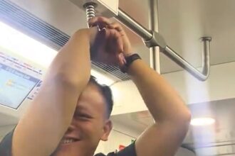 Commuter goes viral after getting hand stuck in train grab rail in Shanghai - passenger left embarrassed but amused as TikTok clip racks up millions of views.