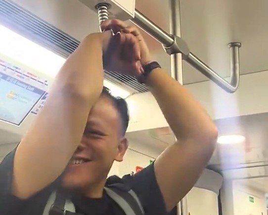 Commuter goes viral after getting hand stuck in train grab rail in Shanghai - passenger left embarrassed but amused as TikTok clip racks up millions of views.