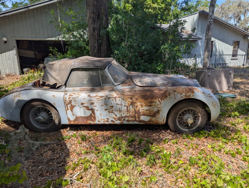 A 1959 Jaguar XK150 barn find is up for sale at £20,000 needing full restoration with matching numbers and rare factory automatic making it a classic car bargain.