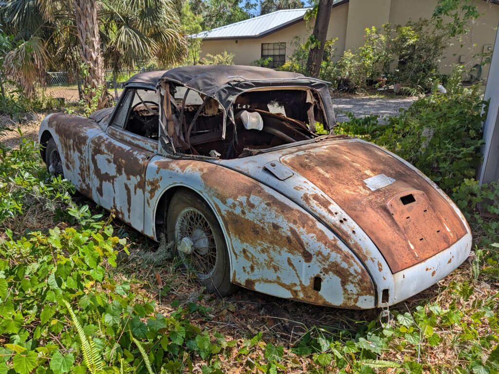 A 1959 Jaguar XK150 barn find is up for sale at £20,000 needing full restoration with matching numbers and rare factory automatic making it a classic car bargain.