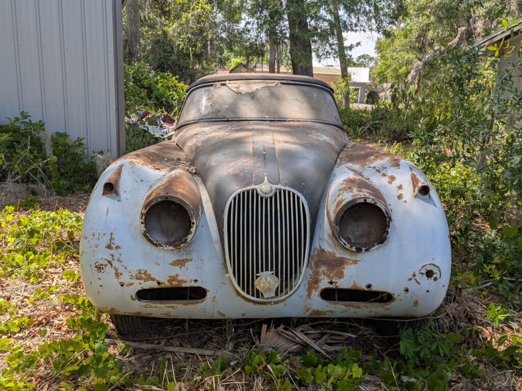 A 1959 Jaguar XK150 barn find is up for sale at £20,000 needing full restoration with matching numbers and rare factory automatic making it a classic car bargain.