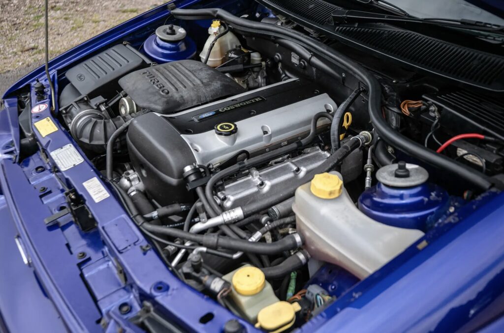 A rare 1996 Ford Escort RS Cosworth Lux with just 22,744 miles sold for £81,563. Iconic whale tail spoiler, 150mph top speed and collector quality make it a gem.