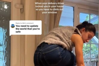 A woman was left trapped in her home after a courier wedged a large Amazon parcel under her front door handle, forcing her to climb out a window to escape the bizarre blunder.