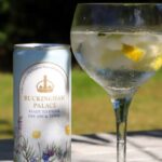 Buckingham Palace launches a £8 gin and tonic in a tin made with botanicals from royal gardens, offering a crisp elegant flavor in a stylish can perfect for picnics.