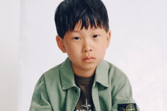 Stone Island mocked for launching £245 over-shirt for kids in new autumn range. Branded youth fashion sparks jokes linking it to football hooligan culture and films.