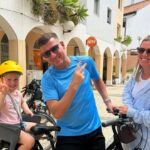 UK couple save money by travelling the world with daughter - Hayley and Lewis Trow swapped boardrooms for beaches and found global adventures cost less than life at home.