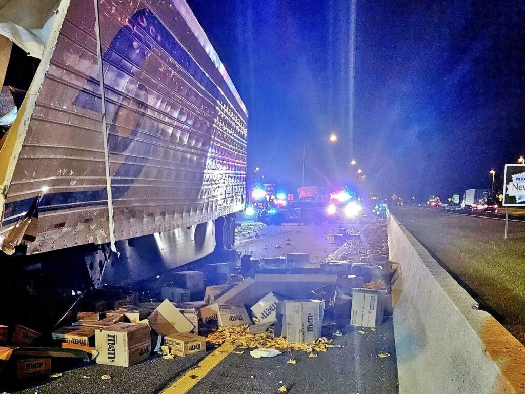 Motorway covered in M\&M’s after lorry crash in New Jersey - Interstate 80 closed as crews cleared sugary mess following collision that spilled chocolate across lanes.