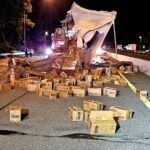 Motorway covered in M\&M’s after lorry crash in New Jersey - Interstate 80 closed as crews cleared sugary mess following collision that spilled chocolate across lanes.