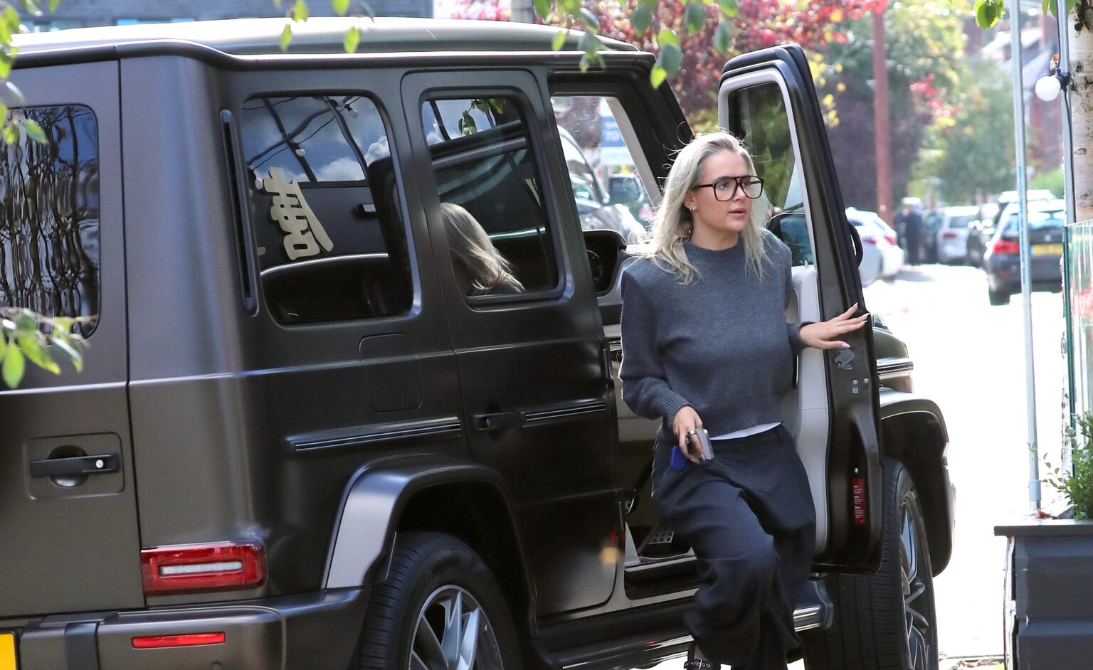Molly-Mae Hague spotted parking her £250k Mercedes G-Wagon on double yellow lines in Cheshire before picking up flowers, sparking criticism over the Love Island star’s move.