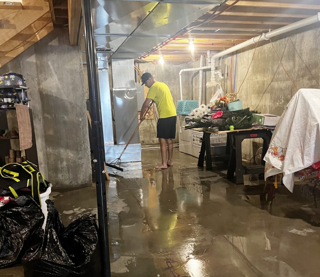 Mum films herself swimming in flooded basement after storm devastates home in Quincy Illinois - viral TikTok shows her coping with loss as family faces huge cleanup.