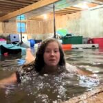 Mum films herself swimming in flooded basement after storm devastates home in Quincy Illinois - viral TikTok shows her coping with loss as family faces huge cleanup.