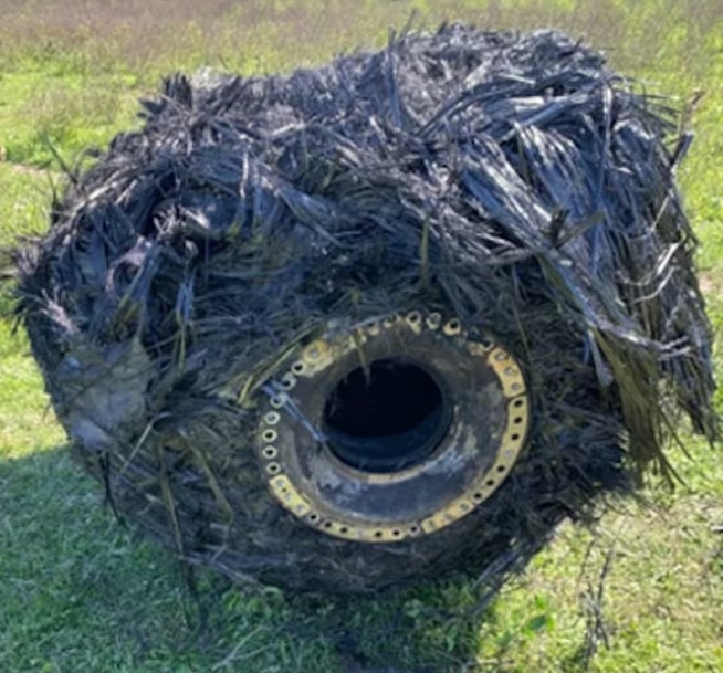A bizarre hairy cylinder fell from the sky onto a farm in Argentina sparking speculation it could be space junk as baffled officials investigate the mysterious object.