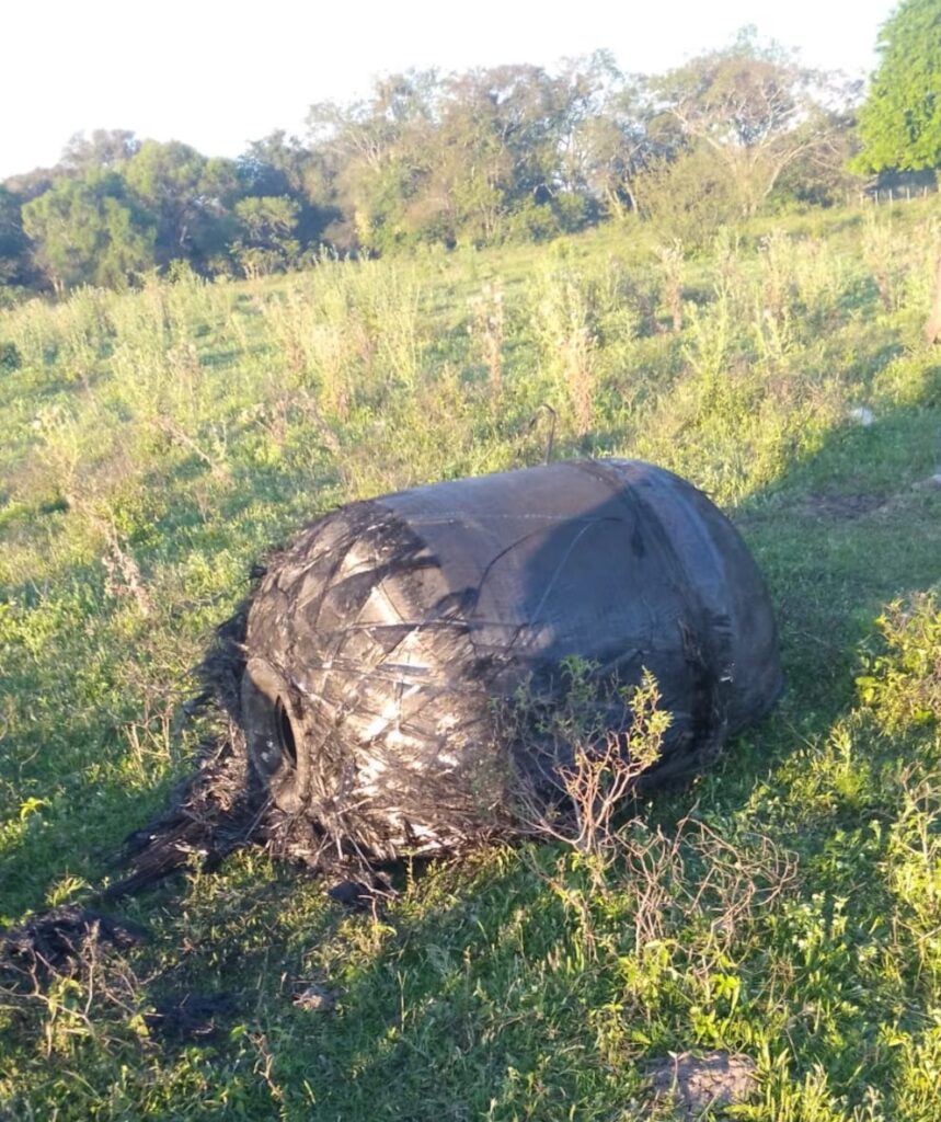 A bizarre hairy cylinder fell from the sky onto a farm in Argentina sparking speculation it could be space junk as baffled officials investigate the mysterious object.