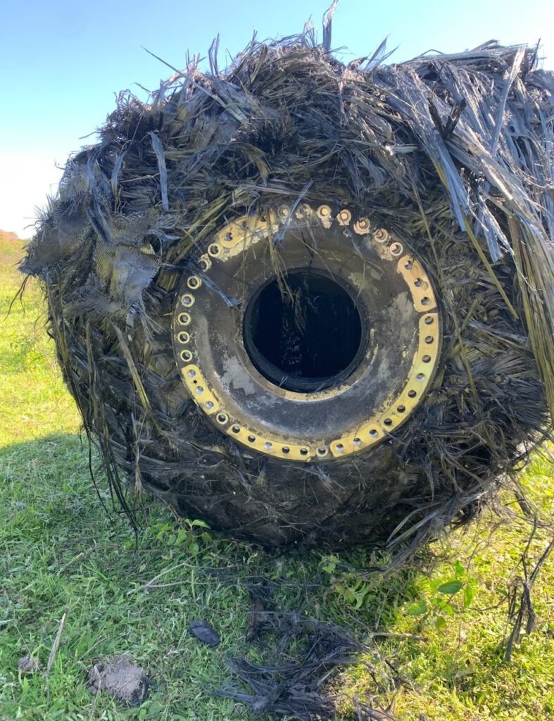 A bizarre hairy cylinder fell from the sky onto a farm in Argentina sparking speculation it could be space junk as baffled officials investigate the mysterious object.