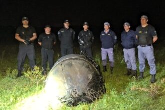 A bizarre hairy cylinder fell from the sky onto a farm in Argentina sparking speculation it could be space junk as baffled officials investigate the mysterious object.