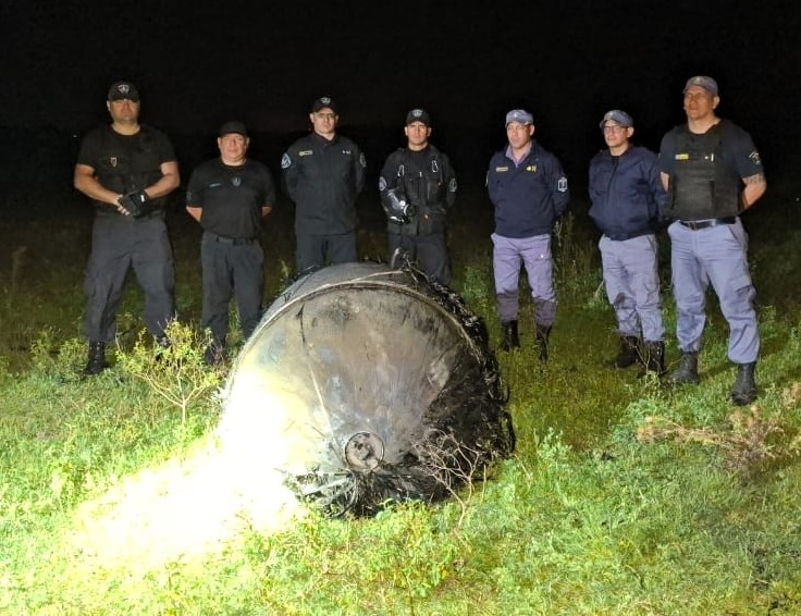 A bizarre hairy cylinder fell from the sky onto a farm in Argentina sparking speculation it could be space junk as baffled officials investigate the mysterious object.