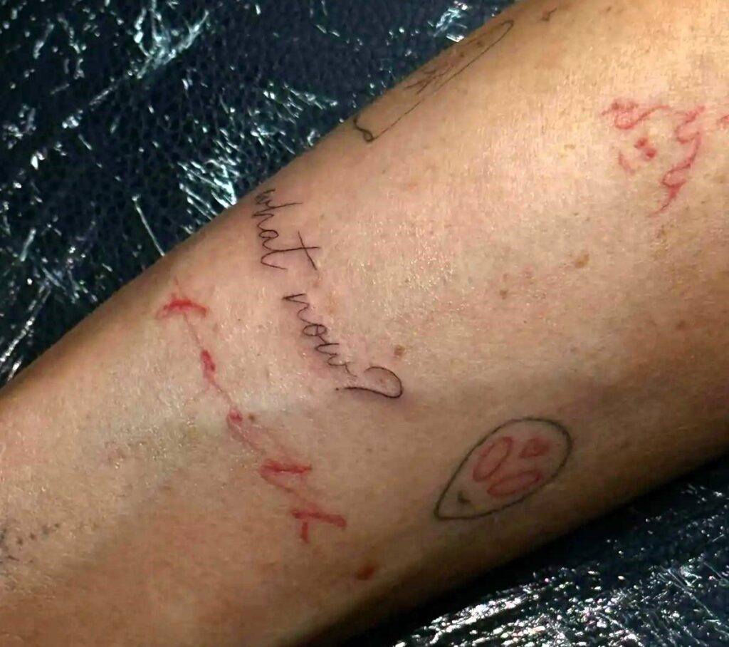 Olivia Attwood debuts new fine line tattoo tribute to her viral catchphrase What now - Love Island star shows off delicate wrist ink inspired by her fans.