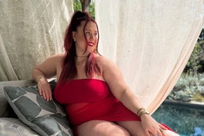 Plus-size model Harmony Albertini has launched a petition to make fatphobia a crime after bakers mocked her in a viral video, sparking outrage and over 11,000 signatures.