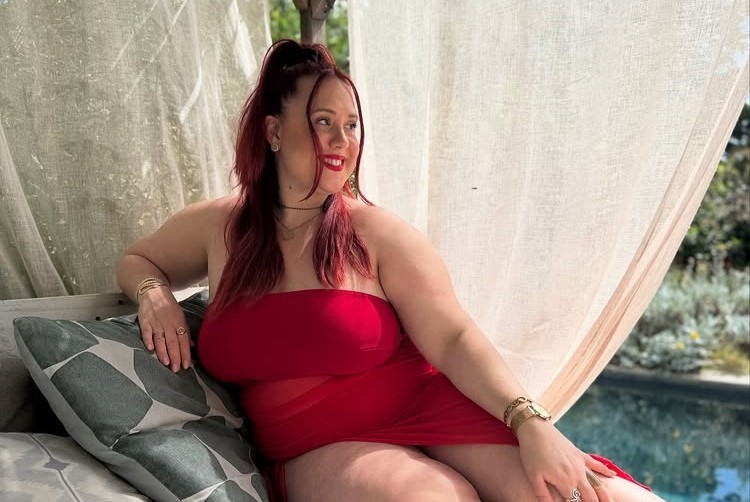 Plus-size model Harmony Albertini has launched a petition to make fatphobia a crime after bakers mocked her in a viral video, sparking outrage and over 11,000 signatures.