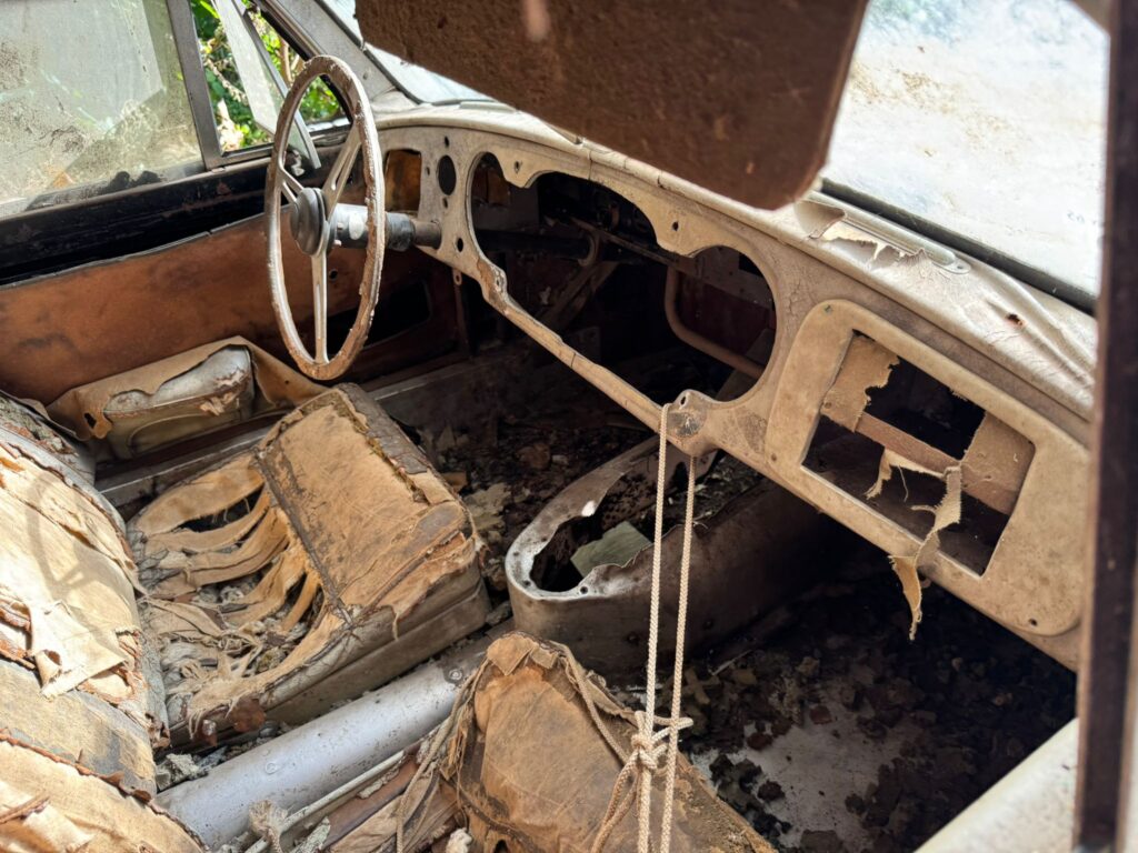 A rare 1953 Aston Martin DB2 Vantage barn find has surfaced for £49,500, missing key parts but offering collectors a rare left hand drive restoration project.