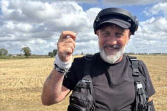 Amateur metal detectorist stumbles on 700 year old gold brooch near Skegness - rare 13th century treasure declared priceless find of a lifetime after stunning discovery.