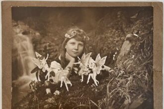 Infamous Cottingley Fairies hoax photos that fooled Sir Arthur Conan Doyle sell for £3,100 at auction - rare full set of prints from 1917 to 1920 discovered in Devon.