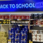 A Tesco in Gillingham amused shoppers after stacking crates of beer under a “Back to school ready” sign, with parents joking it was the perfect end-of-holidays display.