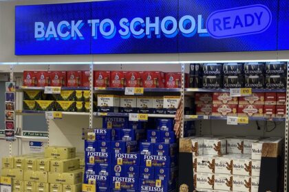 A Tesco in Gillingham amused shoppers after stacking crates of beer under a “Back to school ready” sign, with parents joking it was the perfect end-of-holidays display.