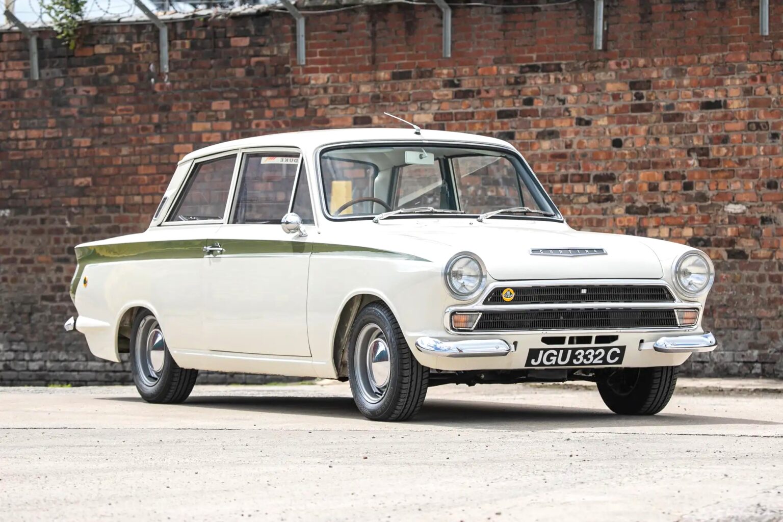 A 1965 Ford Lotus Cortina Mk1 with just 2,561 miles sold for £41,000 at auction, a rare classic restored to outstanding condition and verified by experts.