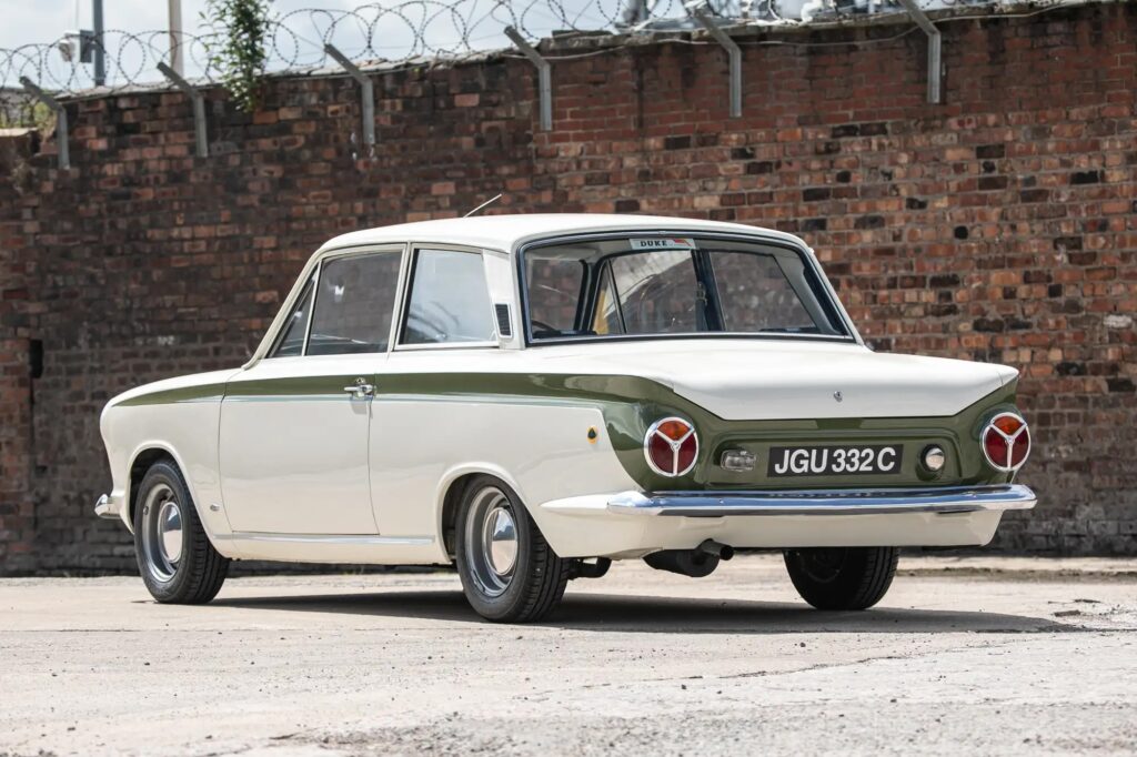 A 1965 Ford Lotus Cortina Mk1 with just 2,561 miles sold for £41,000 at auction, a rare classic restored to outstanding condition and verified by experts.