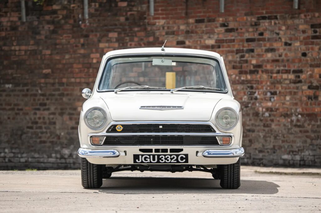 A 1965 Ford Lotus Cortina Mk1 with just 2,561 miles sold for £41,000 at auction, a rare classic restored to outstanding condition and verified by experts.