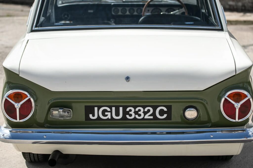 A 1965 Ford Lotus Cortina Mk1 with just 2,561 miles sold for £41,000 at auction, a rare classic restored to outstanding condition and verified by experts.