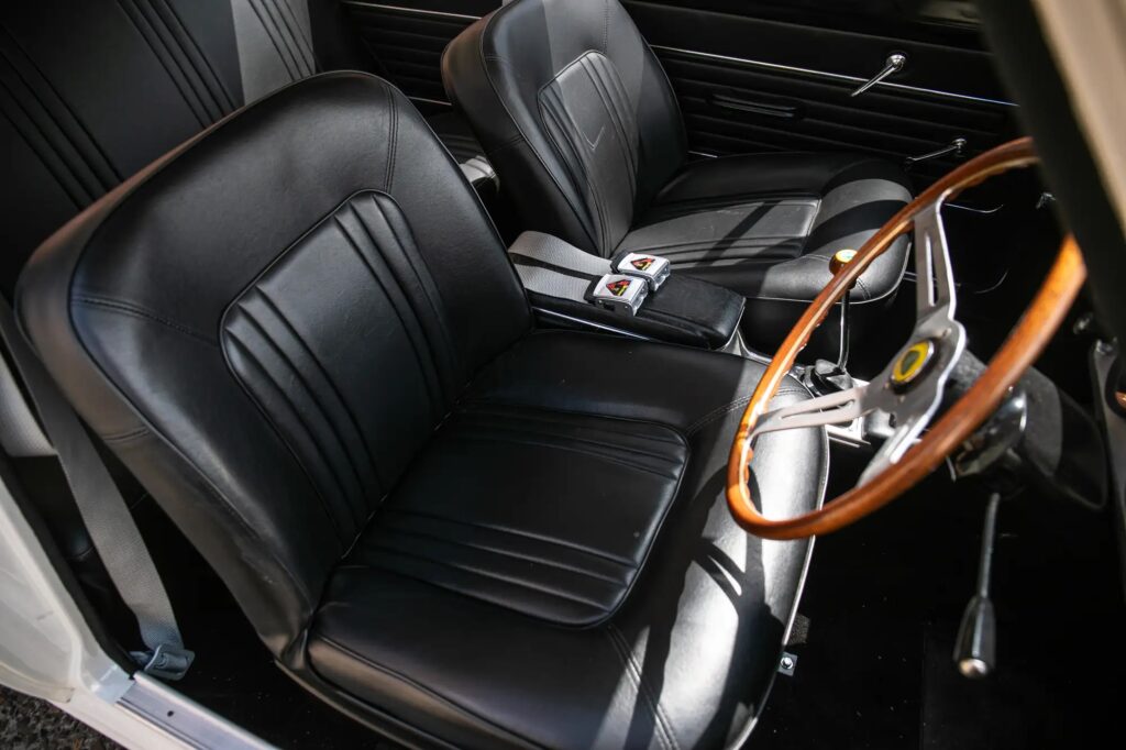 A 1965 Ford Lotus Cortina Mk1 with just 2,561 miles sold for £41,000 at auction, a rare classic restored to outstanding condition and verified by experts.
