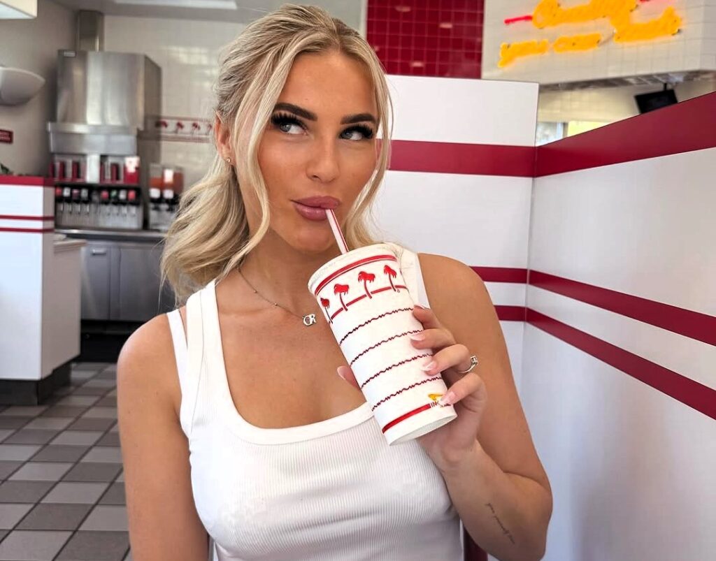 Rapper Sophie Aspin slams Kim Kardashian’s £94 SKIMS joggers saying they give her a granny bottom as fans joke the baggy fit is made for people with BBLs.