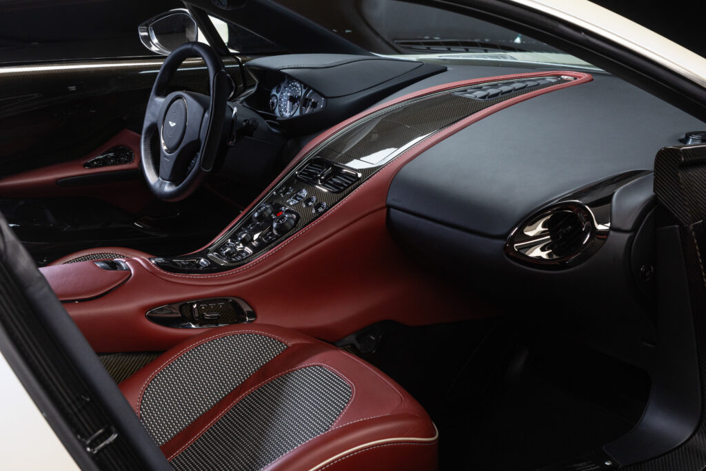 Aston Martin One-77 hypercar heads to auction in Abu Dhabi for £1.18m. One of only 77 made, it boasts a 7.3L V12, 750bhp, 217mph top speed and stunning design.