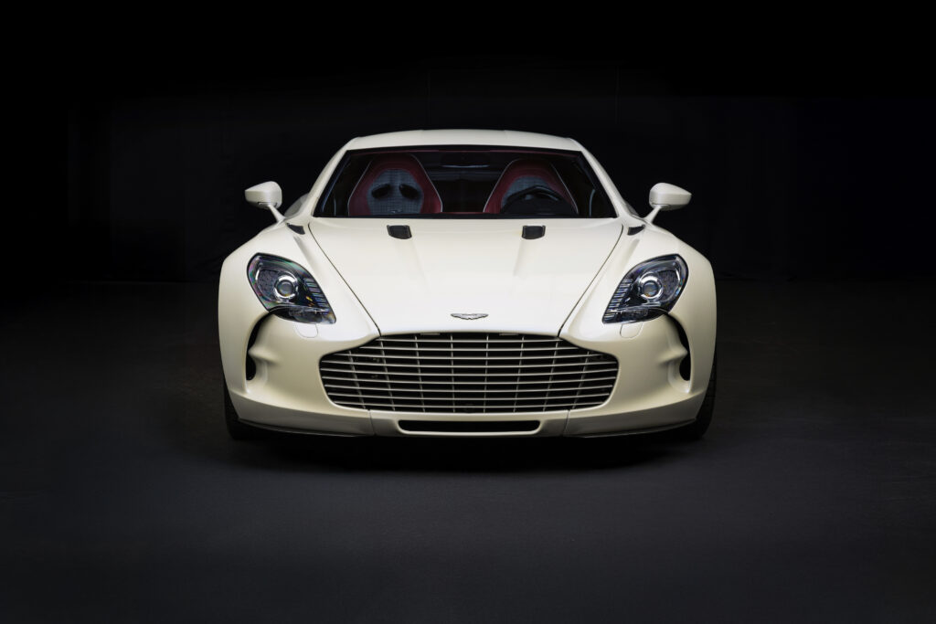 Aston Martin One-77 hypercar heads to auction in Abu Dhabi for £1.18m. One of only 77 made, it boasts a 7.3L V12, 750bhp, 217mph top speed and stunning design.