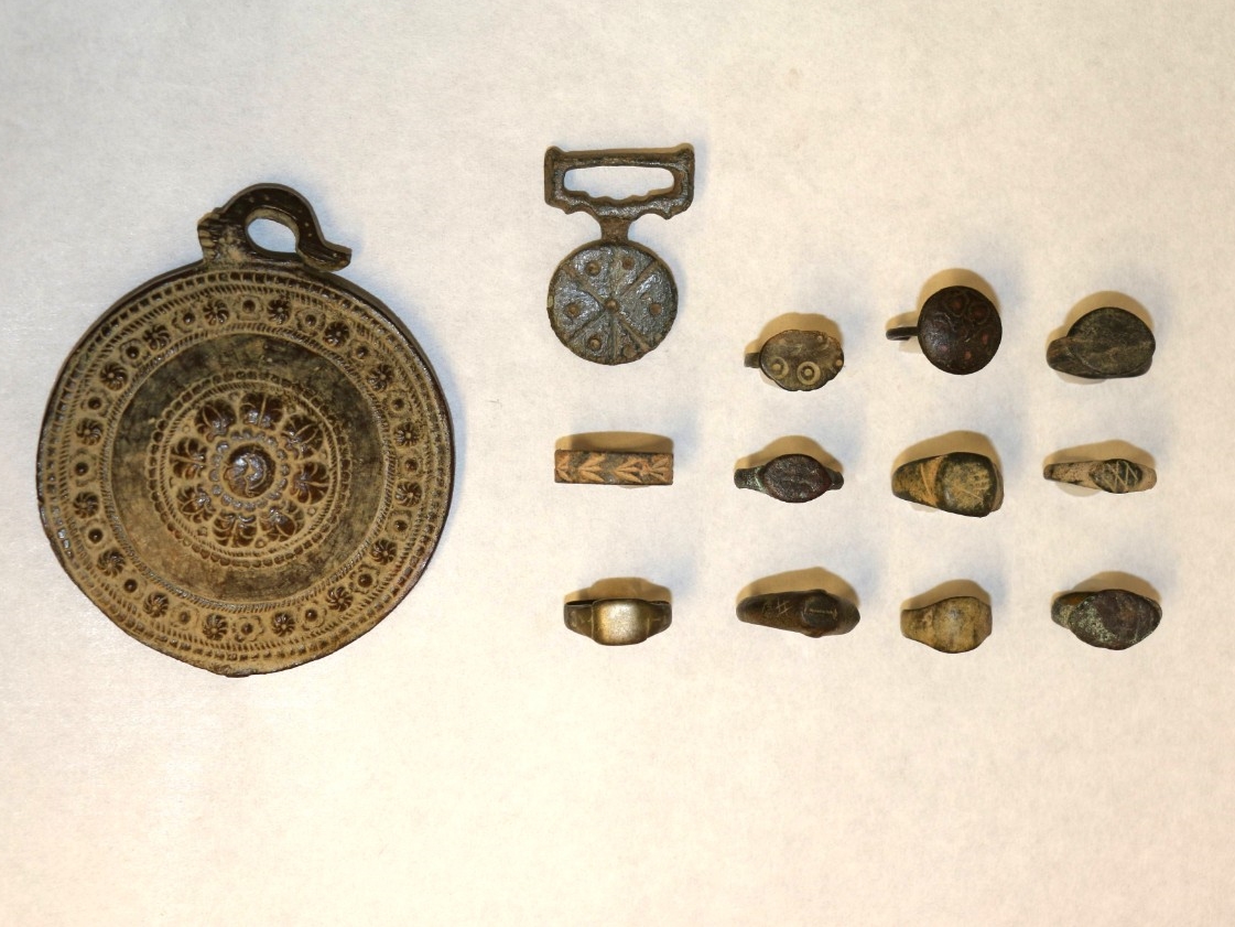 A Canadian thrift shop sold 13 medieval artefacts including rings and medallions for just £16 before experts at Simon Fraser University confirmed their historic significance.