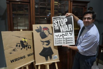 Two rare Banksy protest placards from the 2003 anti Iraq War march featuring Happy Choppers and Bomb Hugger could fetch over £10000 at auction in Newcastle.