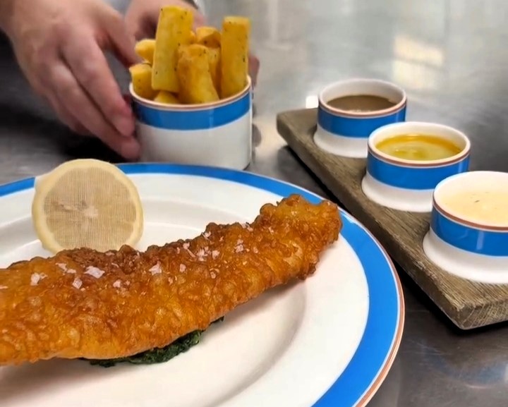 Tom Kerridge faces backlash after charging £35 for haddock and chips with posh sauces at his London restaurant, sparking outrage from fishermen and diners online.