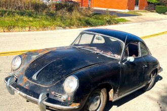 Barn-find 1965 Porsche 356C Coupe listed at £29,000 in New York. Rusted and undriveable but complete with matching numbers, making it a dream restoration project.