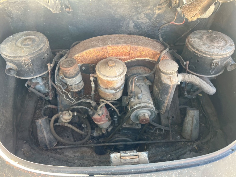 Barn-find 1965 Porsche 356C Coupe listed at £29,000 in New York. Rusted and undriveable but complete with matching numbers, making it a dream restoration project.