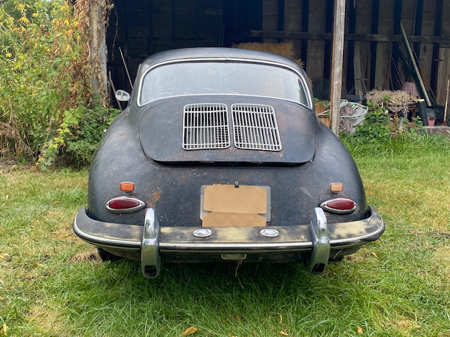 Barn-find 1965 Porsche 356C Coupe listed at £29,000 in New York. Rusted and undriveable but complete with matching numbers, making it a dream restoration project.