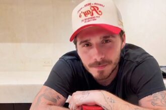 Brooklyn Beckham faced backlash after using Bisto gravy on his luxury beef wellington, with fans calling it a “ruined masterpiece” while others defended his down-to-earth choice.