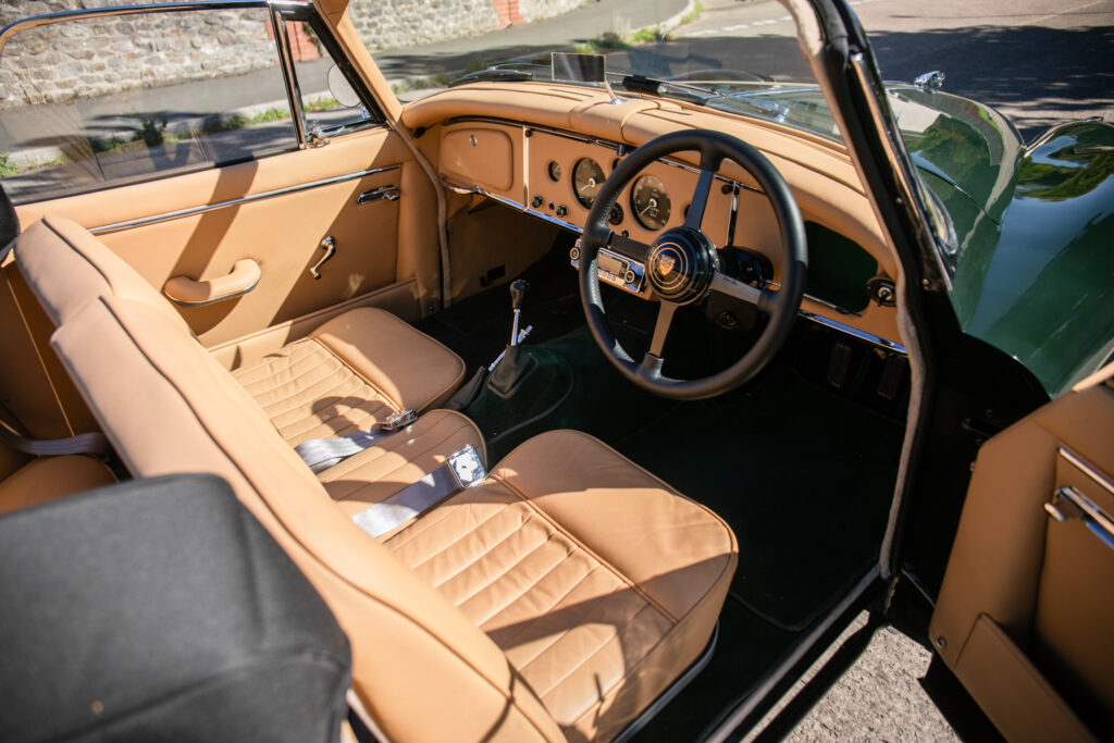A beautifully restored 1959 Jaguar XK150 SE DHC with just 49k miles is set to fetch £85,000 at auction, showcasing timeless design, power and collector appeal.