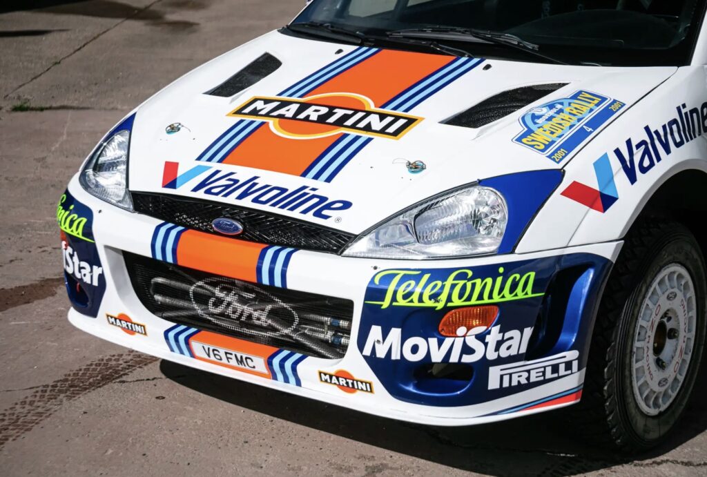 Colin McRae’s ex rally Ford Focus is up for auction at £420,000 with iconic WRC history including wins, legendary drives, and a recent full engine rebuild.