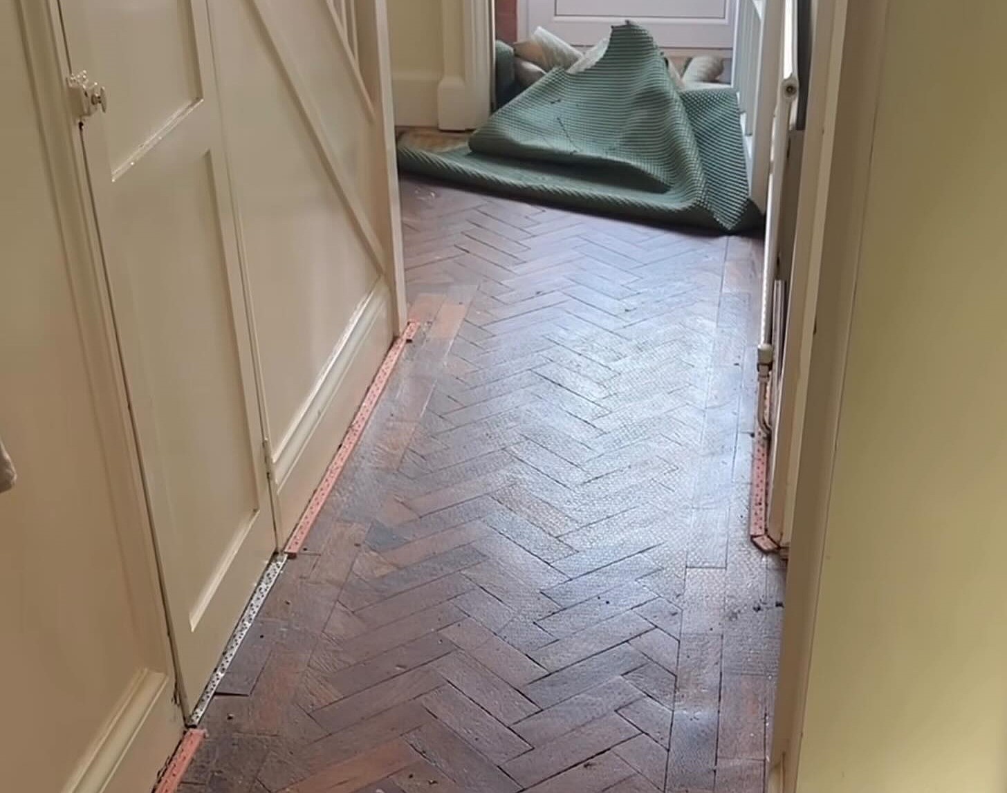 A Leicester couple uncovered stunning herringbone flooring hidden beneath their old carpet, sparking viral fame with 2.5 million views and praise for their lucky home find.
