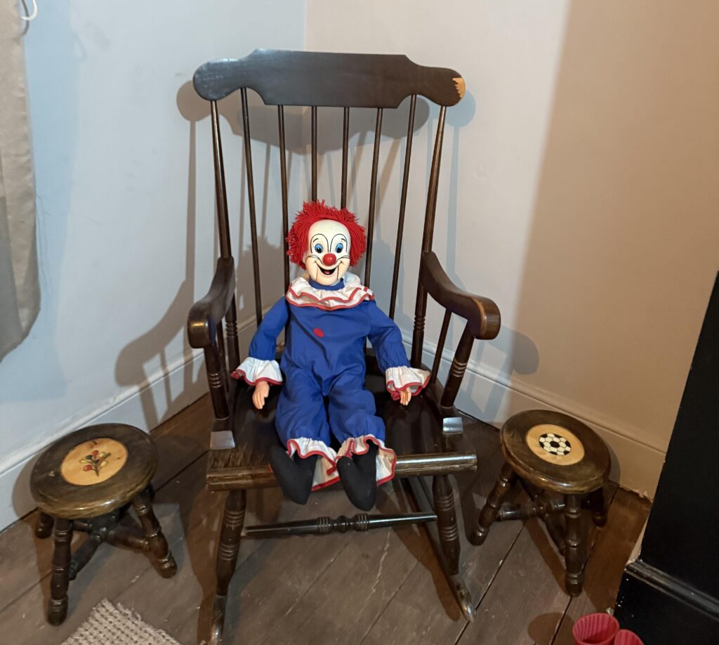Ghost hunters Lee Steer and Sarah Carter claim their haunted clown doll “Bozo” rips off duvets, moves objects, and laughs on camera, terrifying owners and visitors alike.
