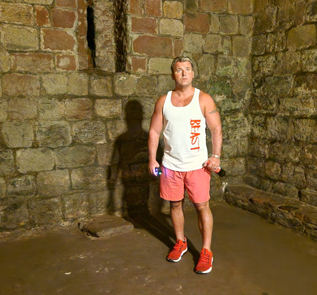 Ghost hunters exploring the abandoned Ridge Lea Asylum in Lancashire heard eerie laughter, footsteps, and voices - one investigator even fell ill during the chilling paranormal encounter.