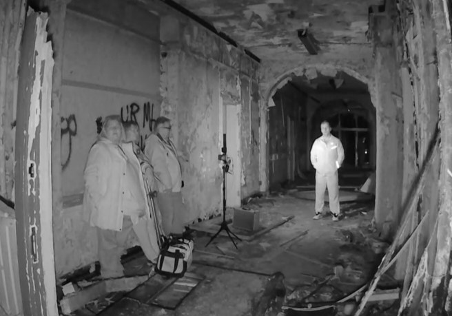 Ghost hunters exploring the abandoned Ridge Lea Asylum in Lancashire heard eerie laughter, footsteps, and voices - one investigator even fell ill during the chilling paranormal encounter.